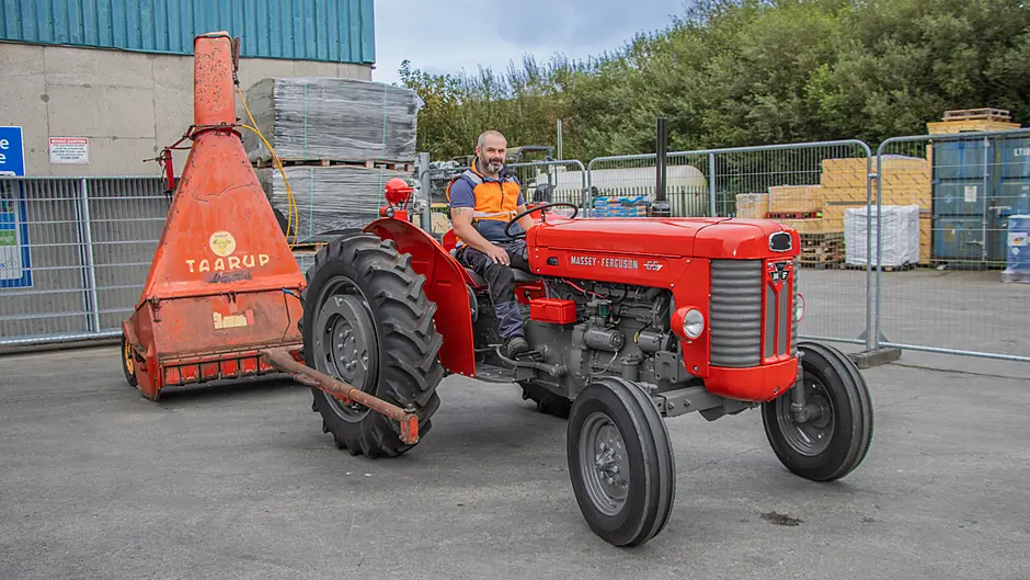 Many hands make light work in the restoration of this Massey Image