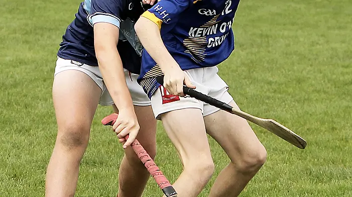 Clonakilty Community College's Finbarr O'Mahony and Hamilton High School's Jack O'Donoghue in a battle for possession. (Photo: Paddy Feen)