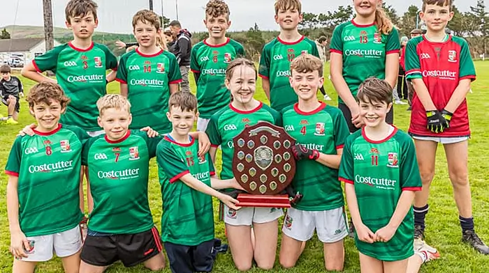 The Glengarriff U12 team that won the final. Back: Eamonn O'Shea, Alfie Harrington,  Lucas Forde, Jack Levis, Nienke Labuschagne, and Liam McCarthy.  Front: Johnnie Russell, Gérard Whooley, Daniel McCarthy, Sophie McCarthy (captain,) Iarla McElhinney, and Guilia O’Sullivan.  (Photo: Anne Marie Cronin)