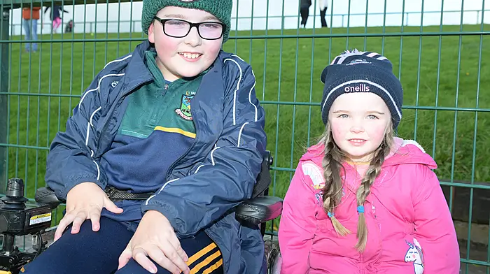 Kilmacabea supporters Dylan Lawlor and his sister Emma at the McCarthy Insurance junior A football championship quarter-final against Carraig na bhFear in Newcestown.  (Photo: Martin Walsh)