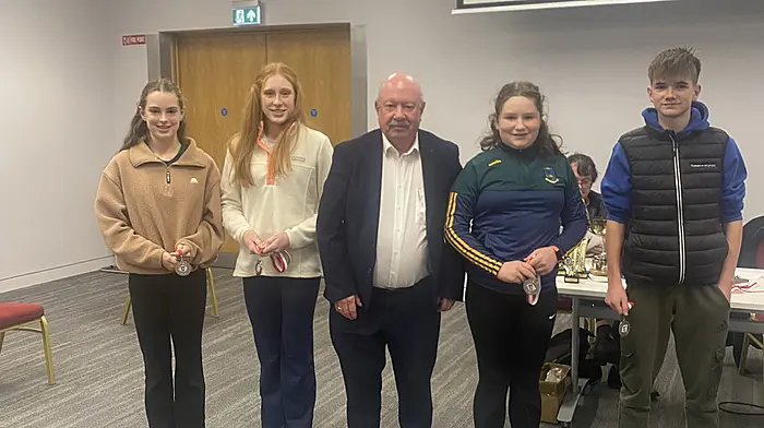 The Kilmacabea Scór na nÓg quiz team of Mary Jo O’Mahony, Heather O’Donovan, Áine Ní Lochlainn and Conor Murphy who came second in the county final held in Páirc Uí Chaoimh being presented with their medals by Tony McAuliffe of the Cork GAA county board.
