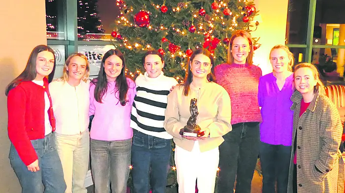 Celebrating with Moira Barrett as she is the well deserved recipient of the October Sports Star of the Month award at the Celtic Ross Hotel are her Ballinascarthy Intermediate camogie team mates: l to r Aoibhín Ryan, Millie Condon, Clara Crowley, Annie Condon, Moira Barrett, Kaela O'Driscoll, Kate O'Donovan and Orlaith Dee.