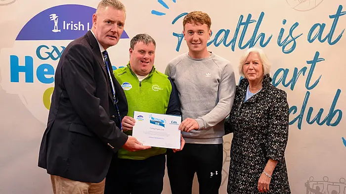 Carbery Rangers GAA club recently became an accredited official GAA Irish Life Healthy Club and also received a bronze medal from The Joe McDonagh Foundation for promoting Irish. Josephine Twomey, Niall Flavin and Paul Hodnett from Carbery Rangers with Tim Murphy, chairman of Munster GAA Council and Bernie Reen.   (Photo: Brendan Moran)