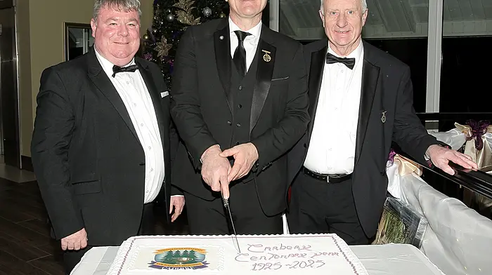 GAA President Jarlath Burns with David Whyte, Carbery GAA Chairman, and Seamus Coakley, Carbery GAA President, cutting the Carbery Centenary cake.  (Photo: Paddy Feen)
(Photos: Paddy Feen)