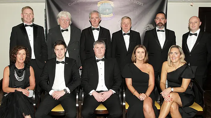 Muintir Bhaire at the Carbery GAA Centenary Gala Ball, seated, from left, Ann O'Mahony, David O'Mahony, Timmy O'Sullivan, Emer Mallon and Kate Arundel. Back, from left, Sean Levis, Tom Spillane, Tim Joe Kelly, Brendan O'Mahony, Frankie Arundel and Keith Mallon. (Photo: Paddy Feen)