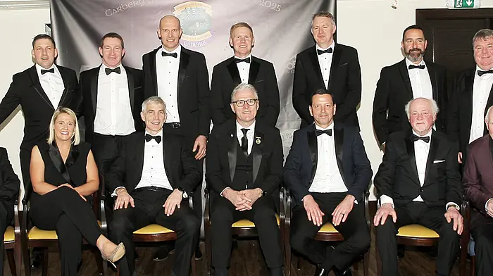 Special guests Jarlath Burns, GAA President; Pat Hogan, Cork County Board chairman, and Jacqui Hurley, RTÉ Sports Presenter, are pictured with members of the 2004 Carbery senior football team that won the county championship. (Photo: Paddy Feen)
