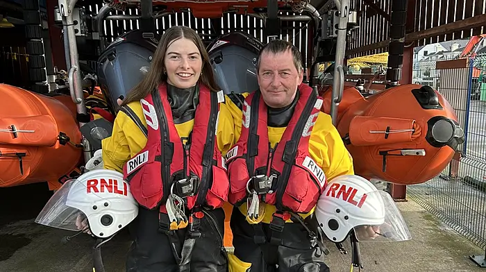 A family affair as dad and daughter front RNLI poster Image