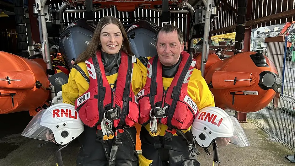 A family affair as dad and daughter front RNLI poster Image