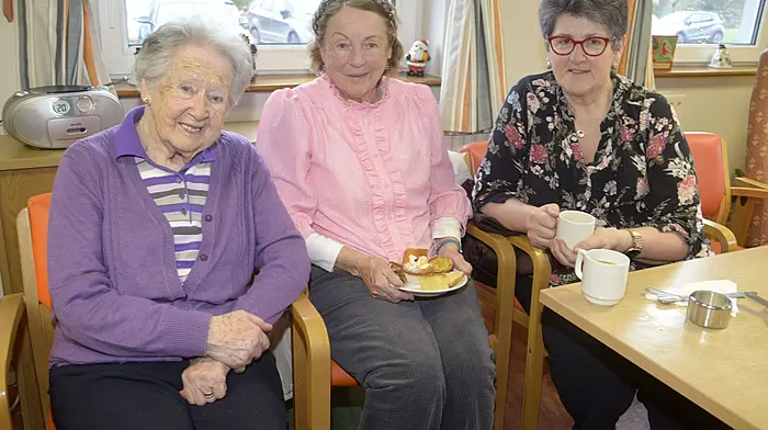 NEWS 6/12/2025 Pictured at the Coffee morning in aid of Bandon day care centre Bridie O'Mahony aged 99 who recently celebrated her birthday with Ann O'Connor and Elizabeth Clarke. Picture Denis Boyle