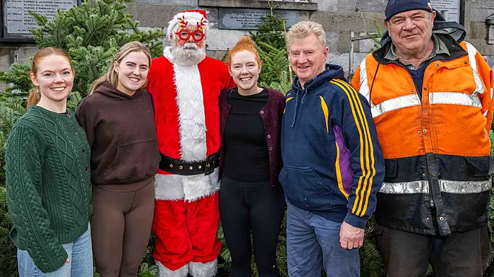 Santa visited the Marino Church in Bantry last Sunday where there were big queues to visit him. Chatting with Santa as he visited were Katie, Libby, Maggie and Tim Coppinger from Coomhola and Christmas tree salesman Pat O'Leary from the Mealagh Valley.  (Photo: Andy Gibson)