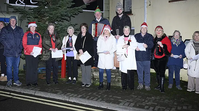 Everyone ready to sing some Christmas carols in Timoleague last Sunday evening prior to the exciting arrival of Santa. (Photo: Martin Walsh)