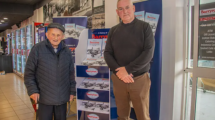 Local historian John O’Regan, Butlerstown, met up with Philip O’Regan at Barryroe Co-op where Philip was signing copies of his book A history of Barryroe Co-op.   (Photo: Gearoid Holland)