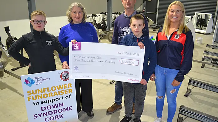 Skibbereen Rowing Club chairperson Sean Murran and committee member Marie Hourihane were delighted to present a cheque for €1,400 from the sunflower fundraiser to Jack O'Donovan, Ruben Deane and Aileen O'Donovan accepting on behalf of Cork Down Syndrome Cork. The club was delighted to support the local charity, which among other services, provides one-on-one speech therapy classes in Skibbereen. The club would like to thank everyone who supported the fundraiser and added a bit of colour to a busy market day in the town. (Photo: Anne Minihane)