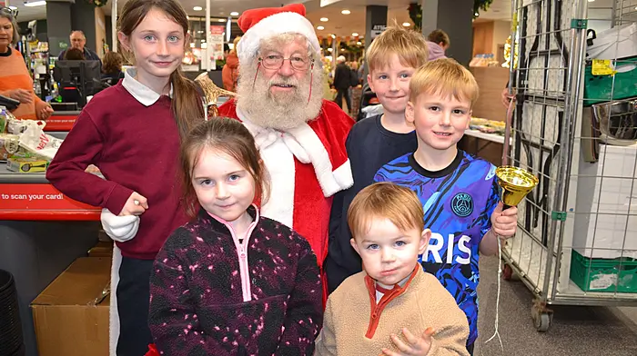 Clodagh, Tadhg and Alannah Goggin (Baltimore) with Calum and Shane Casey (Durrus) all delighted to meet Santa at Fields of Skibbereen’s annual 8th of December Christmas celebration. (Photo: Anne Minihane)
