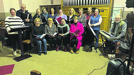 Folk group strikes a festive chord Image