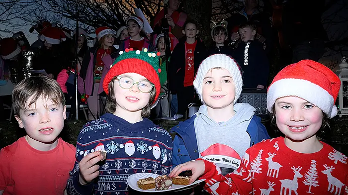Enjoying some eats at the Carol Service in Ardfield in aid of Ardfield/Rathbarry First Responders were (left to right): Eli White, Hugo Geaney, Rian Sean Gaynor and Grace O'Donovan. Photo: Martin Walsh.