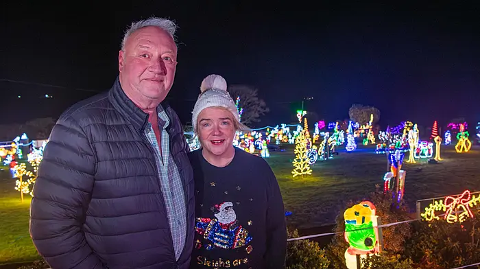 Dunmanway, West Cork, Ireland. 18th Dec, 2025. A huge Christmas Lights display is wowing the population of Dunmanway and its surrounds. The brainchild of Michael & Chrissy O'Mahony, the charity light display has even been viewed by a family from Co. Tipperary. The lights have been a tradition for 20 years and this year the proceeds are going to Breakthrough Cancer Research; West Cork Palliative Care and Co-Action Dunmanway. The display runs until 6th January. at P47 NN67. Pictured are Michael & Chrissy O'Mahony with just a part of their Christmas Lights display. Picture: Andy Gibson.