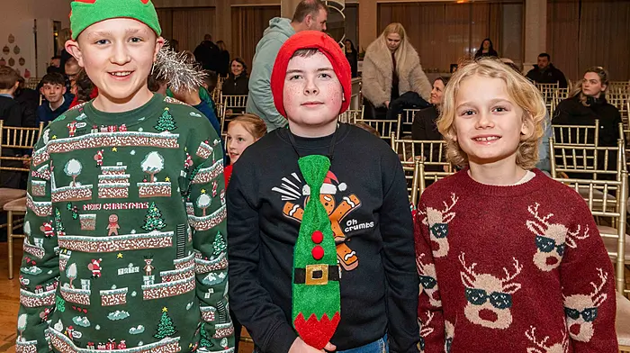 Rosscarbery, West Cork, Ireland. 17th Dec, 2025. Reenascreena National School held its Christmas concerts at the Celtic Ross Hotel in Rosscarbery last night. With 50 school children performing, the room was packed with parents and relatives. Pictured at the event were Conor Crowley; Daniel Lettice and Patrick Juosponis, all from Reenascreena. Picture: Andy Gibson.