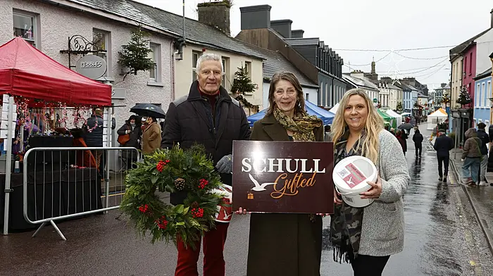Schull Gifted winter solstice Christmas market organisers Tim O'Connor, Amanda O'Connell and Karen Sheehan at Schull Main Street. Photo by Carlos Benlayo