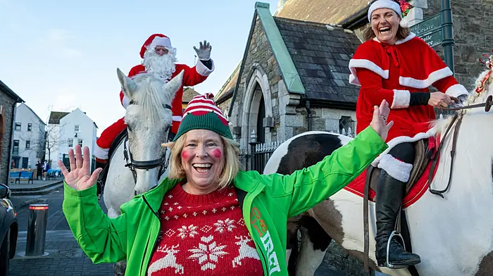 Happy Elf Catherine Wilson with Santa and Mrs Claus on horseback in Kinsale collecting for Kinsale Community Hospital.Picture. John Allen