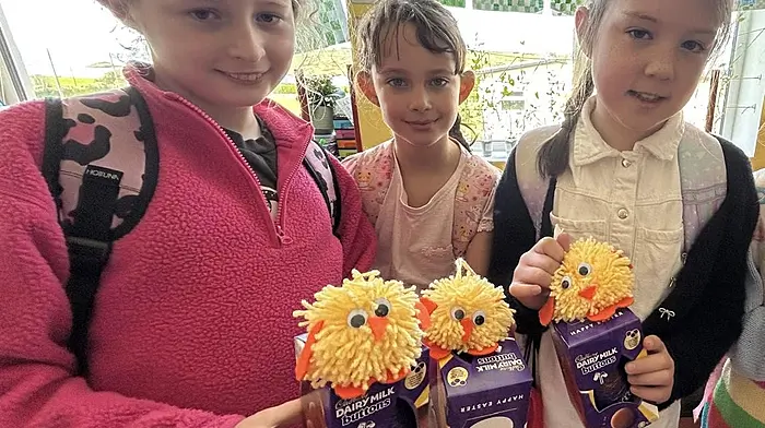 Anna O’Neill, Isla Buggy and Isabelle Sheehy with their handmade Easter chicks and an Easter treat from the staff of Rath National School.