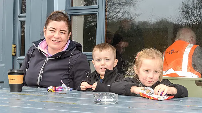 Lisa McCarthy and Stephen and Grace Caddogan (Drimoleague) enjoying their snacks at the Leap tractor and car run which was held on Easter bank holiday Monday. The run was held in aid of Bru Columbanus.  (Photo: David Patterson)