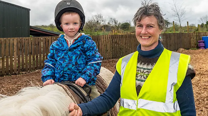 Dylan Fitchett from Macroom enjoying a ride on a pony, led by Nicky Van Worden, at the Easter family afternoon hosted by the Hairy Henry Educational Trust.  The event was held to raise funds for the ‘Giddy Up and Go’ teen programme and included pony rides, meeting the farm animals, crafts, games and an Easter egg hunt.  (Photo: Andy Gibson)