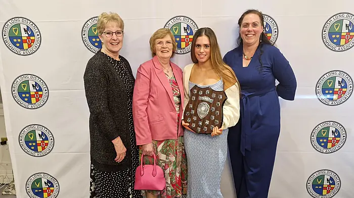 Imelda Lynch, Ann Flanagan and Breda O'Driscoll with Charlotte O'Driscoll, who collected the Young Female of the Year swimmer award at the recent ILDSA award ceremony.