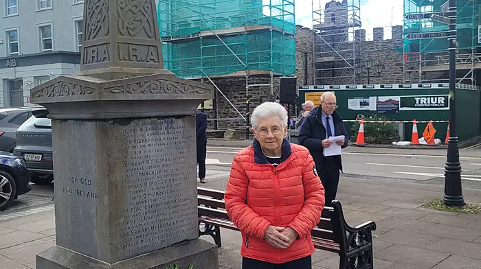 Maura Kiely laying a wreath at the monument on the square in Macroom on Easter Sunday.