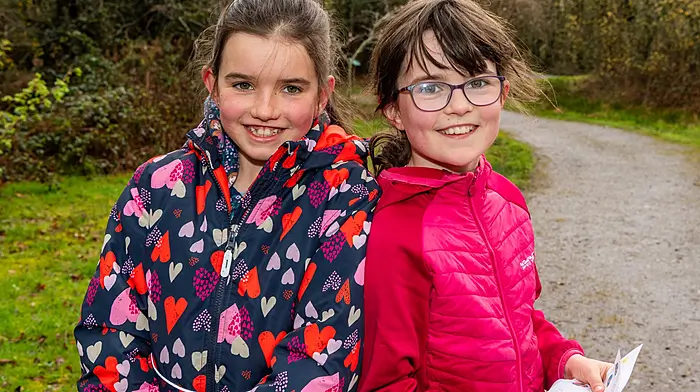 Aisling Holland from Coomhola and Amy McCarthy from Glengarriff enjoying Cappabue National School’s third annual Easter egg hunt which was held last Friday in the Parklands in Kealkill.   (Photo: Andy Gibson)