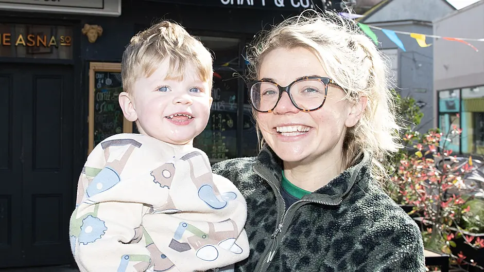 Emma and Oisín Hurley from Ardfield enjoying the music session provided by the third and fourth class pupils from Ardfield National School in Astna Square, Clonakilty on Friday last in aid of the Special Olympics.  Photo: Martin Walsh.