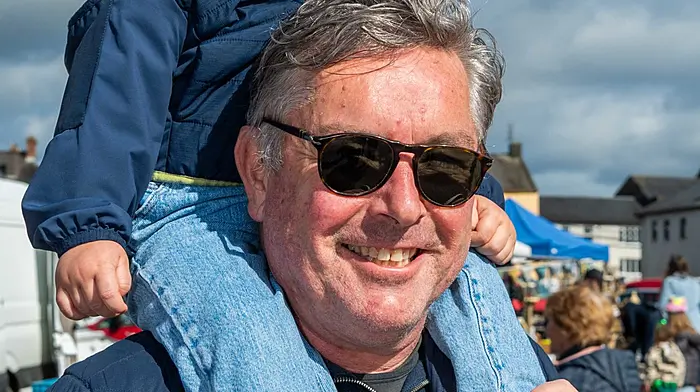 Skibbereen, West Cork, Ireland. 14th Mar, 2026. The sun shone in Skibbereen today, which brought out hundreds of people to the weekly farmers market. Enjoying the warm weather were Evan Powell, Co. Clare and Ivan Powel, Co. Tipperary. Picture: Andy Gibson.