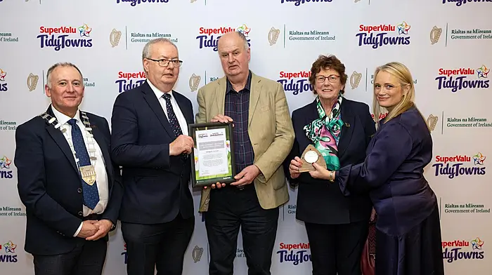 Minister Michael Moynihan and Maighread Cremin (community and sponsorship manager with SuperValu), Andrew O’Shea and Mary T O’Shea (Glengarriff Tidy Towns representatives) and Cllr Michael Foley (Kerry County Council) at the Tidy Towns regional awards which were held recently in Tralee.  (Photo: Don McMonagle)