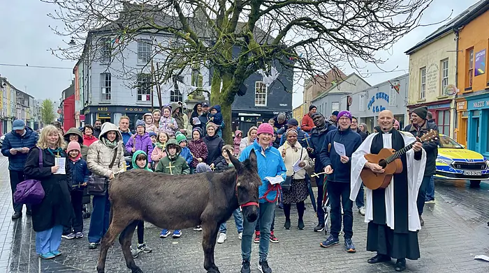 Rev Kingsley Sutton with Linda, and her donkey Coco, at Asna Square for the Palm Sunday parade through Clonakilty.