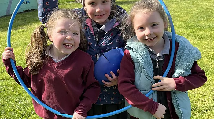 Some of Dromore National School’s junior infant pupils Aeilín O’Shaughnessy, Ciara Draper and Hannah Daly, having fun during friendship break last Friday.