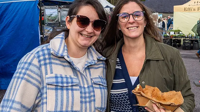 Marta Zubinska (Bantry) and Maria Garcia (Durrus) enjoying the warm weather recently at the farmers market in Skibbereen.  (Photo: Andy Gibson)