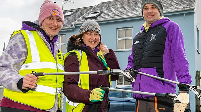 Rosscarbery, West Cork, Ireland. 11th Apr, 2026. Hundreds of volunteers took part in the KWD West Cork & Kerry County Clean-Up Day and An Taisce’s National Spring Clean in villages around the region. Despite the wet weather, many Tidy Town volunteers donned gloves and cleaned up in Rosscarbery and surrounds. Enjoying the litter pick were Clodagh Whelton; Marlena Tarnopolska and Ray Tarnopolski of Rosscarbery Tidy Towns. Picture: Andy Gibson.
