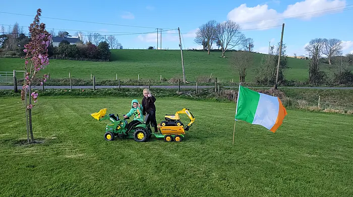 Alex and Emily Lucey from Coomhola parked up their machines last Tuesday in respect of all the Irish people in the protest, and are still parked up as they can't afford to move. Their mum Catherine captured the moment on camera.