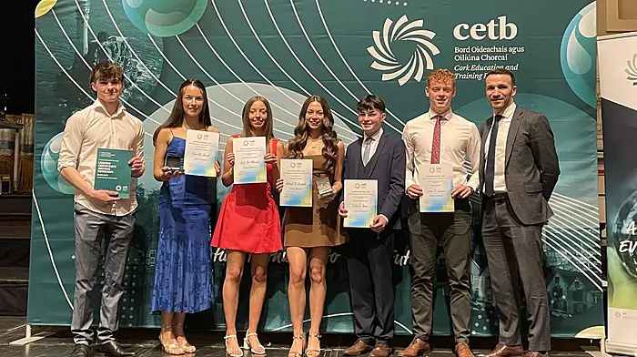 At the annual Cork ETB Leaving Certificate awards ceremony held at City Hall, six members of the class of 2025 from Coláiste Ghobnatan were recognised.  From left: Dominic Geslers, Clara Ní Chonaill, Aoife Ní Mhurchú, Aibigéal Ní Loingsigh, Colin Ó Tuama, Conor Ó Cróinín agus principal Máistir Ó Colmáin.