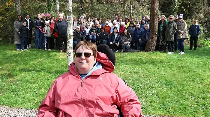 The large gathering at the unveiling of a seat to the late Francis Corkery in Belgooly.