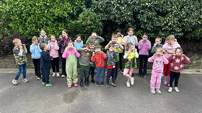 Children making music at the Easter camp held at the Caha Centre with their Sound Sandwich harmonicas made as part of a physics workshop.