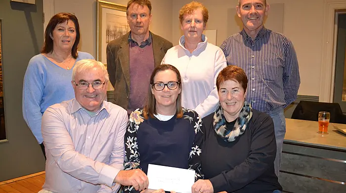 Declan Coakley (chairman) and Mary Cahalane (committee, Skibbereen Athletic Club) presenting  the proceeds of the Noreen McCarthy Road Races to Shirley McCarthy of Skibbereen Community Hospital. Back: Eileen Hourihane (club secretary), Paddy McCarthy and Siobhan Delaney (committee members), and John McCarthy (club treasurer).   (Photo: Anne Minihane)