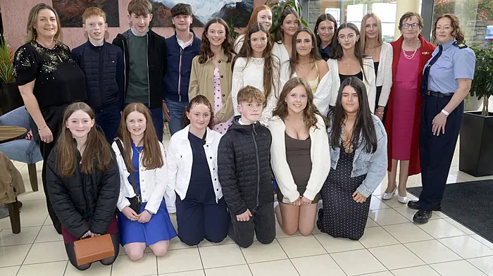 Ballinascarthy Foróige, group award winners at the West Cork Garda Youth Awards, with leaders Louise O'Callaghan and Berry Hennessy alongside Garda Brigid Hartnett.  (Photo:  Denis Boyle)