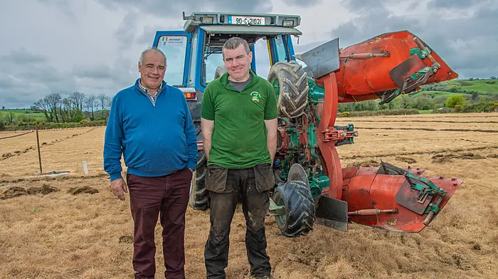 The competition ploughing series for West Cork drew to a conclusion with the Clogagh event that took place near Ballinascarthy. The poor weather affected the schedule of events with events delayed as a result.  Larry Bergin (director, National Ploughing Association) and Jer Coakley (winner of the senior reversible class) at the Clogagh Ploughing Match.   (Photo: Gearoid Holland)