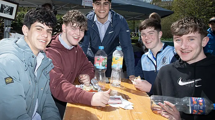 Clonakilty Community College students (from left): Josh Khan, Dylan Falvey, Yousef Al-Rubeji, Lochlann Rohan and Gavin O'Neill enjoying their lunch break in Kennedy Gardens. (Photo: Martin Walsh)