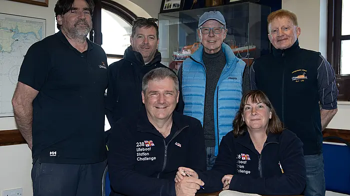 Sussex couple Allan and Helen Thornhill visited the Courtmacsherry Lifeboat Station last Tuesday and were pictured with (standing, from left): Ken Cashman (coxswain, Courtmacsherry Lifeboat), Dan Daly (Courtmacsherry RNLI launch authority), Ian Anderson (Courtmacsherry RNLI fundraising committee) and Vincent O'Donovan (Courtmacsherry RNLI press officer). The couple's Courtmacsherry visit was the 201st of 238 planned visits to all the RNLI stations in Ireland and the UK.  (Photo: Martin Walsh)