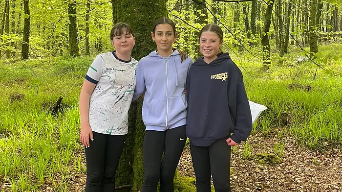 Sixth class pupils at Rath National School, Emma Cottrell, Maya O’Flynn and Sophie Connolly, enjoying orienteering in Droumilihy Woods, Leap.
