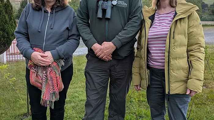 Susan O’Regan (social prescribing link worker), Calvin Jones (freelance wildlife enthusiast) and Kathryn Kingston (coordinator, Caha Centre) at the Dawn Chorus event at the Caha Centre.