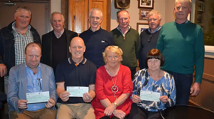 The proceeds from the annual Aughadown St Patrick's Day charity walk in Lisheen was presented at Minihan's Bar recently. The money raised was presented to Aughadown Community Council, and Schull and Skibbereen Community Hospitals. Front: Michael Collins (representing Schull Hospital), Dominic Casey (Aughadown Community Council), Joss Keohane (Minihan's Bar) and Helen Connolly (representing Skibbereen Hospital).  Back: organising committee members Raymond Duggan, Martin O'Mahony, Denis O'Driscoll, Sean Collins, Mike Keohane (Minihan's Bar) and Sean O'Driscoll.  (Photo: Anne Minihane)