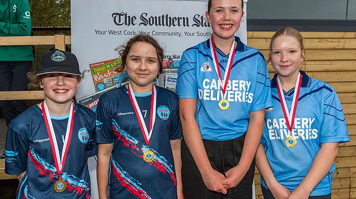 The St. Mary's/Model School crew delighted with their medals. (Photo: Andy Gibson)